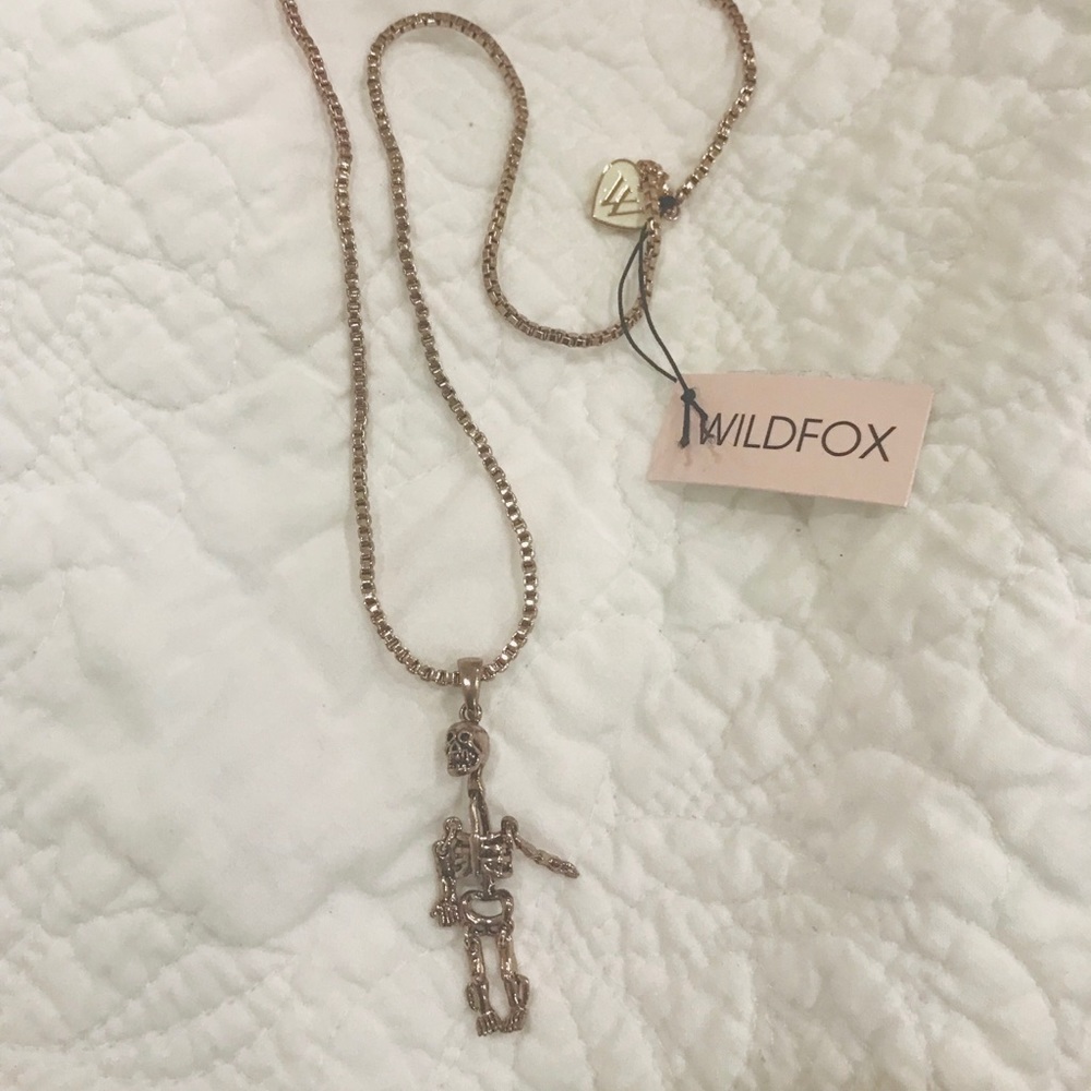 Hematite chain necklace with miniature skeleton